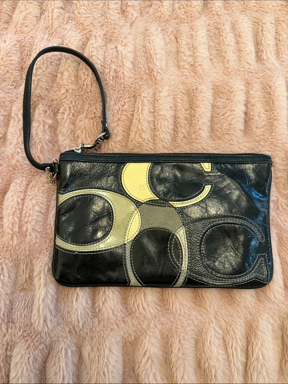 Coach Black Leather Wristlet with cream and gray coach symbols
